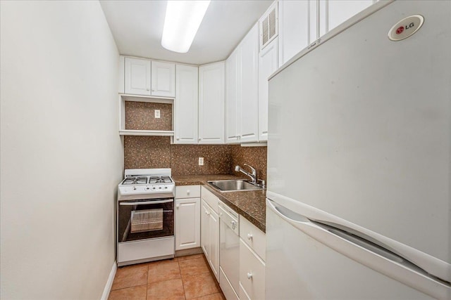 54-44 Little Neck Pkwy Unit 5G, Little Neck, NY 11362 - kitchen featuring white appliances, white cabinets, tasteful backsplash, and dark countertops
