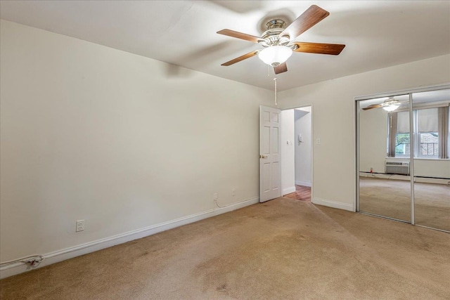 54-44 Little Neck Pkwy Unit 5G, Little Neck, NY 11362 - unfurnished bedroom featuring light colored carpet, a closet, and a ceiling fan