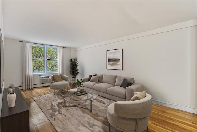54-44 Little Neck Pkwy Unit 5G, Little Neck, NY 11362 - living area with hardwood / wood-style flooring and an AC wall unit