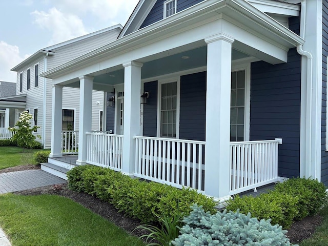 11 Schuyler Dr, Red Hook, NY 12571 - view of side of home featuring covered porch