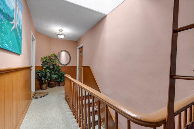 5-17 51st Ave, Long Island City, NY 11101 - hallway with carpet floors, a wainscoted wall, and wooden walls