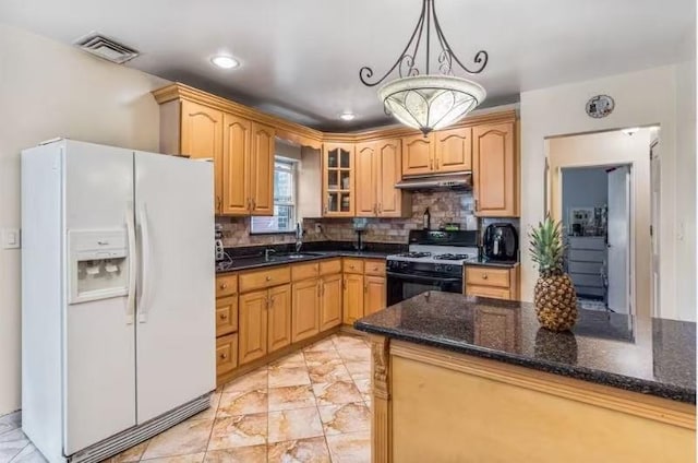 49-75 175th Pl, Fresh Meadows, NY 11365 - kitchen featuring white fridge with ice dispenser, gas range, under cabinet range hood, glass insert cabinets, and a sink