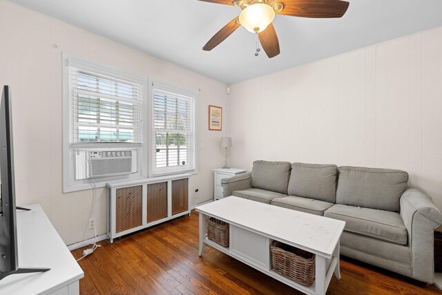 206 Brower Ave, Rockville Centre, NY 11570 - living room with radiator heating unit, a ceiling fan, cooling unit, and wood finished floors