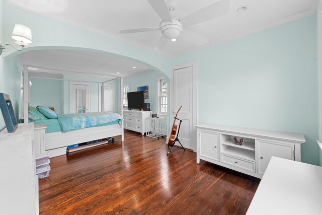 206 Brower Ave, Rockville Centre, NY 11570 - bedroom with arched walkways, wood finished floors, and ornamental molding