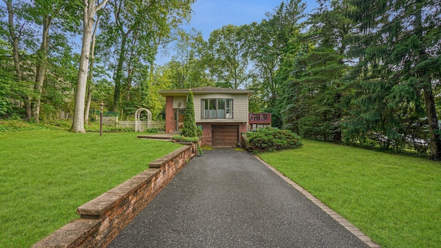 6 Sycamore Pl, Smithtown, NY 11787 - bi-level home with brick siding, driveway, a garage, and a front lawn