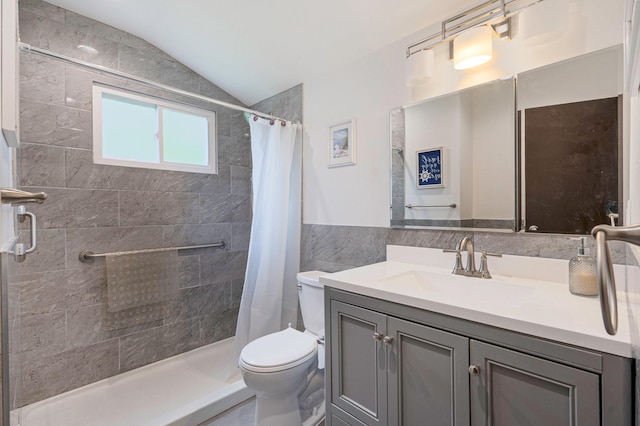9 Laurie Rd, Brentwood, NY 11717 - full bathroom with tile walls, vanity, a shower stall, and lofted ceiling