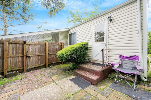 9 Laurie Rd, Brentwood, NY 11717 - view of patio featuring entry steps