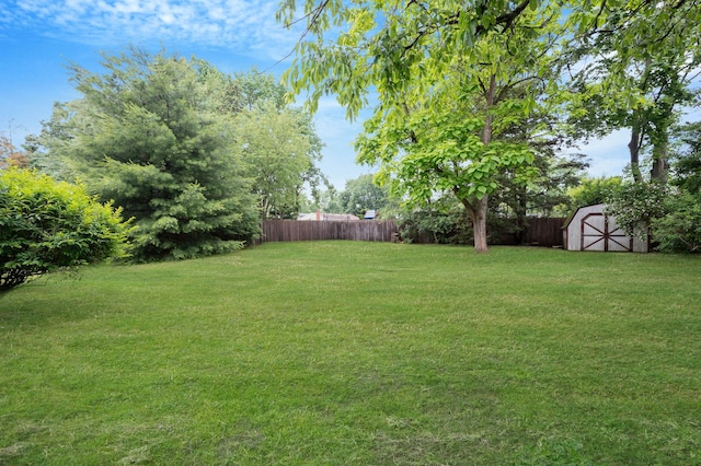 9 Laurie Rd, Brentwood, NY 11717 - fenced backyard with a shed