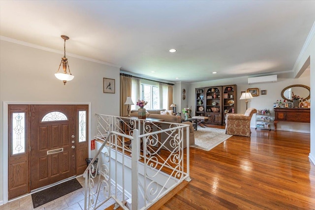 528 Longacre Ave, Woodmere, NY 11598 - foyer entrance featuring a wall mounted air conditioner, crown molding, wood finished floors, and recessed lighting