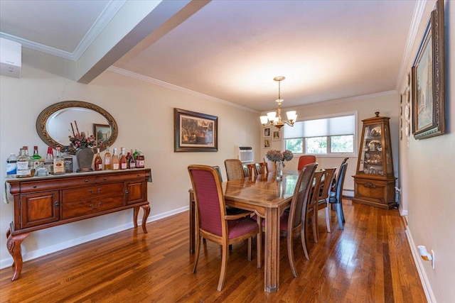 528 Longacre Ave, Woodmere, NY 11598 - dining area featuring dark wood-type flooring, a chandelier, baseboards, ornamental molding, and a baseboard radiator