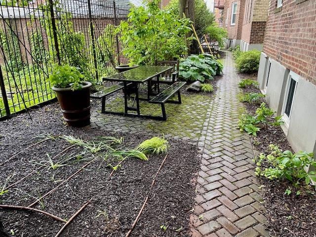 72-17 34th Ave Unit 1H, Jackson Heights, NY 11372 - view of yard with a patio