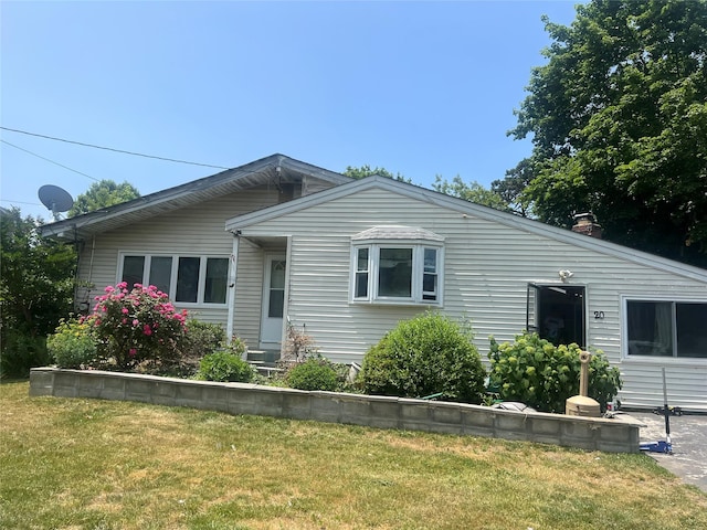 20 Rollin Ln, Brentwood, NY 11717 - view of front of home featuring a front lawn