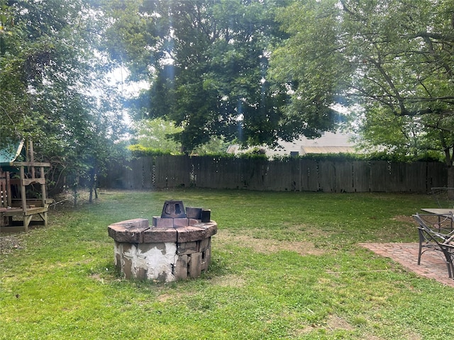 20 Rollin Ln, Brentwood, NY 11717 - view of yard with a fire pit and a patio area