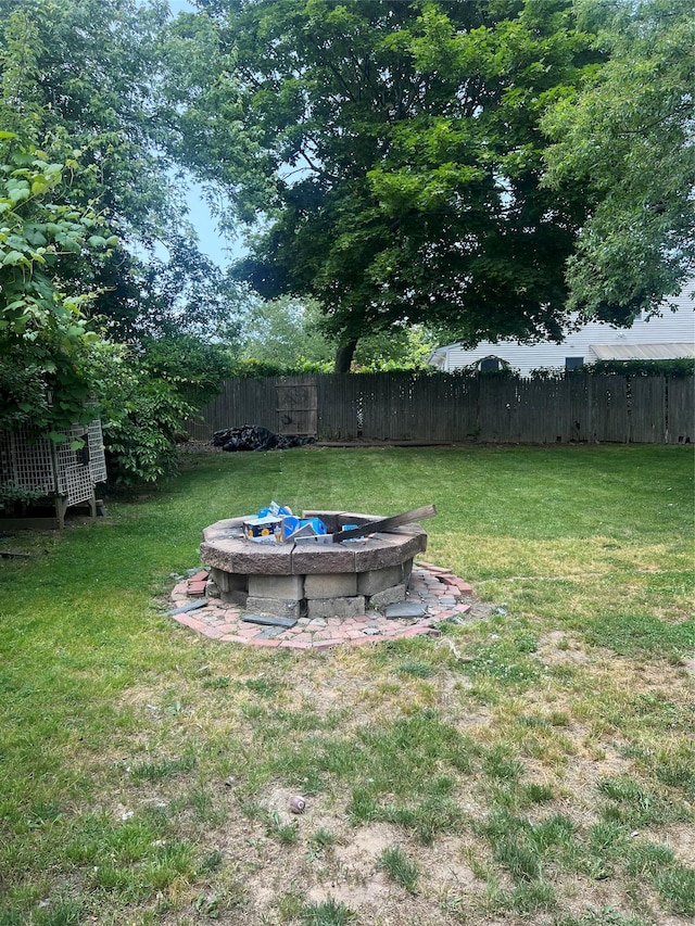 20 Rollin Ln, Brentwood, NY 11717 - view of yard with an outdoor fire pit