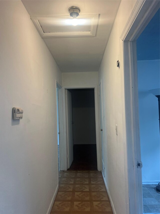 20 Rollin Ln, Brentwood, NY 11717 - corridor with attic access and baseboards