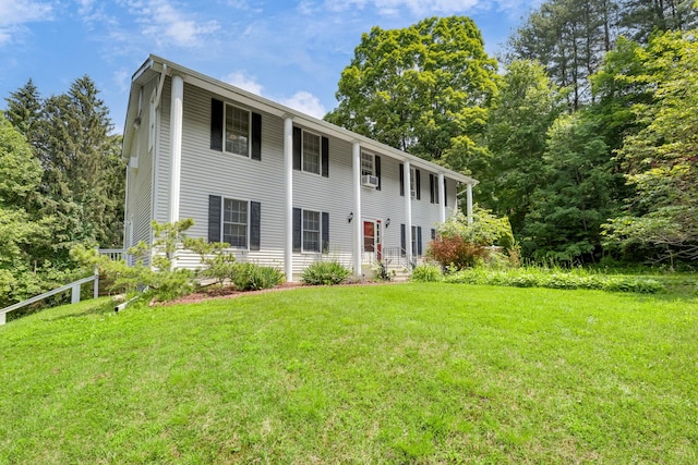 8 Mueller Mountain Rd, Putnam Valley, NY 10579 - colonial-style house featuring a front yard and cooling unit