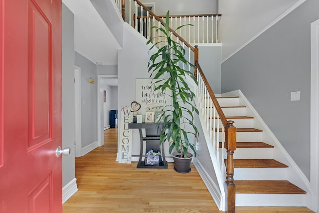 8 Mueller Mountain Rd, Putnam Valley, NY 10579 - foyer entrance with wood finished floors, baseboards, a high ceiling, and stairs
