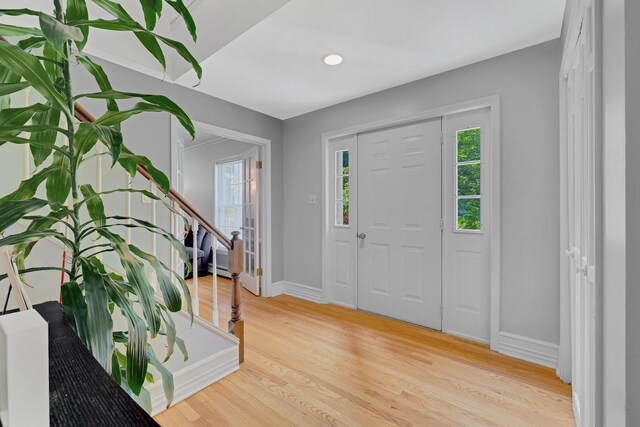 8 Mueller Mountain Rd, Putnam Valley, NY 10579 - foyer with baseboards, light wood-type flooring, and stairway
