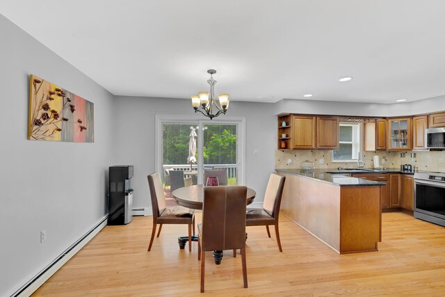 8 Mueller Mountain Rd, Putnam Valley, NY 10579 - dining room with a baseboard heating unit, a chandelier, light wood-style floors, and recessed lighting