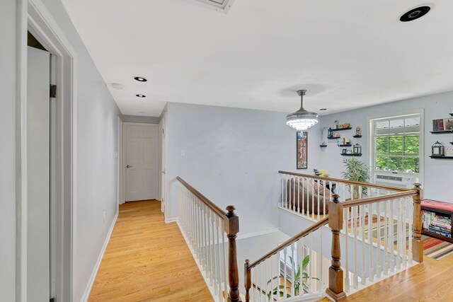 8 Mueller Mountain Rd, Putnam Valley, NY 10579 - corridor with an upstairs landing, light wood-style floors, baseboards, recessed lighting, and cooling unit