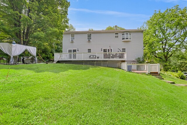8 Mueller Mountain Rd, Putnam Valley, NY 10579 - back of property with a wooden deck and a yard