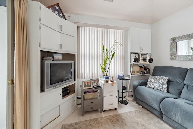 34 Alden Park Unit 34, Bronx, NY 10465 - living room featuring a baseboard heating unit, light wood-style floors, and baseboard heating