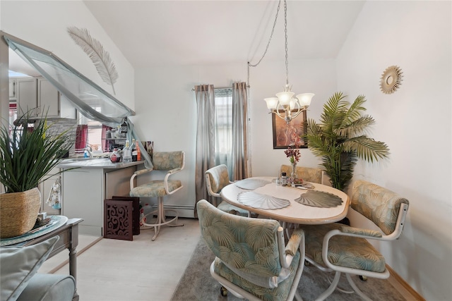 34 Alden Park Unit 34, Bronx, NY 10465 - dining area with a chandelier, a baseboard radiator, and light wood-type flooring