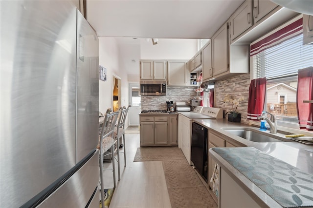 34 Alden Park Unit 34, Bronx, NY 10465 - kitchen featuring stainless steel appliances, tasteful backsplash, and light countertops