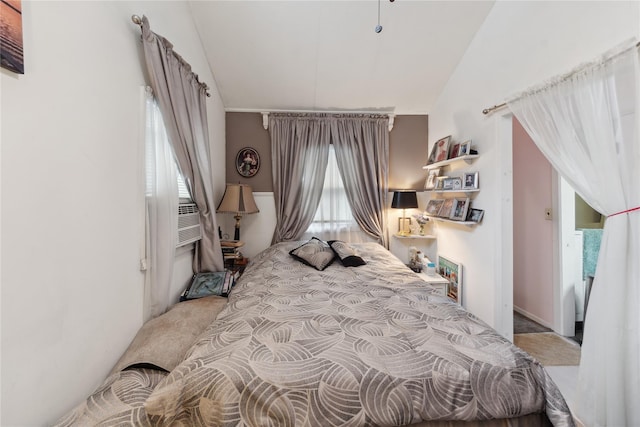 34 Alden Park Unit 34, Bronx, NY 10465 - carpeted bedroom featuring vaulted ceiling and cooling unit