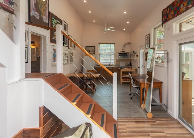 6807 State Route 42, Woodbourne, NY 12788 - stairs with recessed lighting, wood finished floors, plenty of natural light, a ceiling fan, and high vaulted ceiling