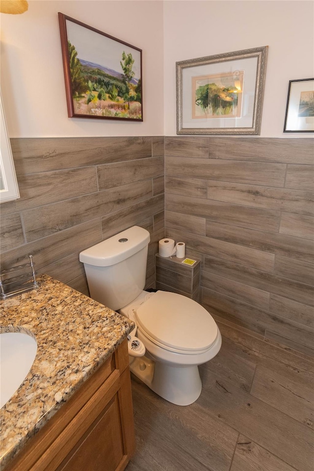 6807 State Route 42, Woodbourne, NY 12788 - bathroom featuring tile walls, vanity, and wainscoting