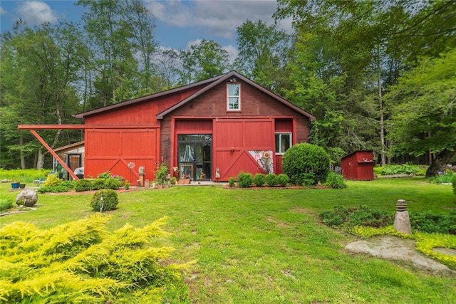 6807 State Route 42, Woodbourne, NY 12788 - view of front of home with an outdoor structure, a front yard, and a barn