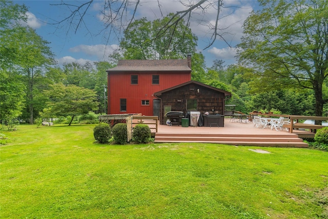 6807 State Route 42, Woodbourne, NY 12788 - rear view of property featuring a yard, a deck, and a chimney