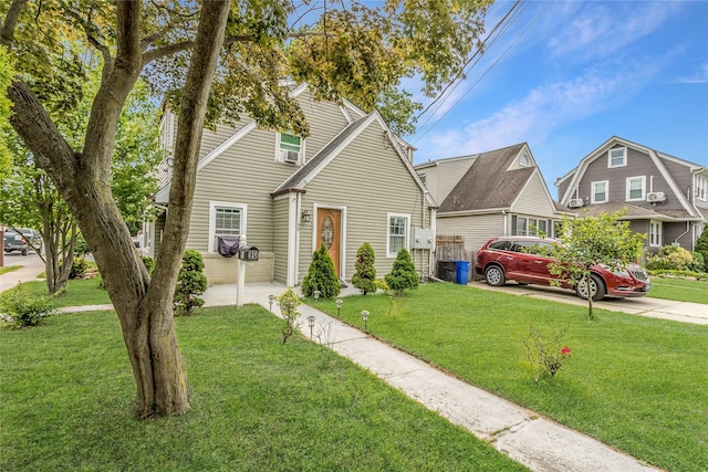 90 Charles St, Lynbrook, NY 11563 - view of front facade with a front yard