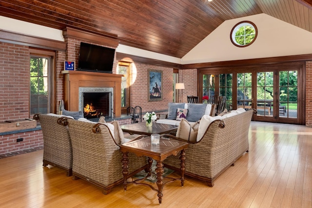 842 Sleepy Hollow Rd, Briarcliff Manor, NY 10510 - living area with a premium fireplace, plenty of natural light, wood-type flooring, wooden ceiling, and high vaulted ceiling