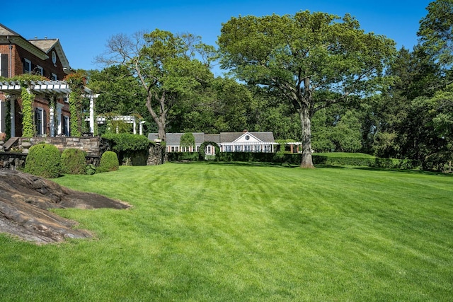 842 Sleepy Hollow Rd, Briarcliff Manor, NY 10510 - view of grassy yard with a pergola