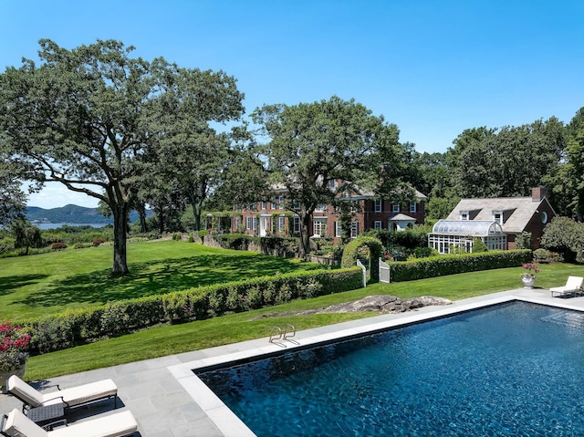 842 Sleepy Hollow Rd, Briarcliff Manor, NY 10510 - swimming pool with a yard and a mountain view