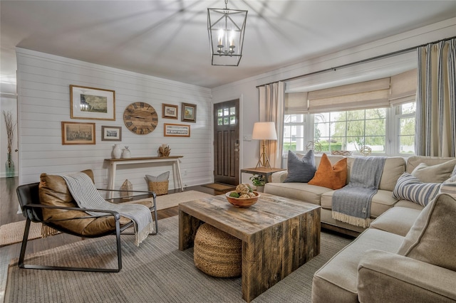 25 Jackwill Rd, East Patchogue, NY 11772 - living area with wood finished floors and a chandelier