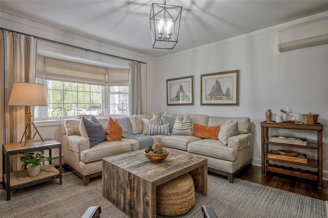 25 Jackwill Rd, East Patchogue, NY 11772 - living area with wood finished floors, a chandelier, crown molding, and a wall mounted air conditioner