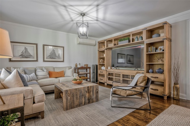 25 Jackwill Rd, East Patchogue, NY 11772 - living area featuring a wall mounted AC, wood finished floors, a chandelier, and crown molding