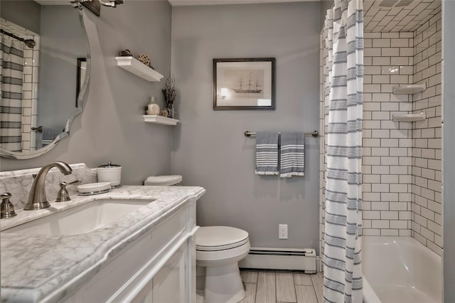 25 Jackwill Rd, East Patchogue, NY 11772 - bathroom with a baseboard radiator, vanity, shower / bath combination with curtain, and wood finished floors