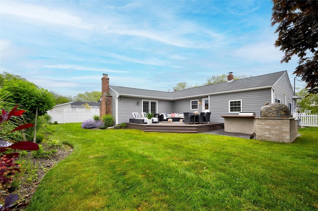 25 Jackwill Rd, East Patchogue, NY 11772 - back of property with outdoor lounge area, a wooden deck, and a chimney
