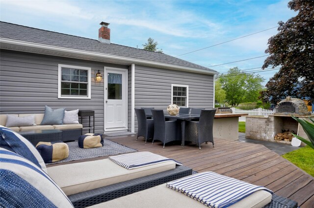 25 Jackwill Rd, East Patchogue, NY 11772 - wooden deck featuring outdoor dining space and an outdoor living space with a fireplace