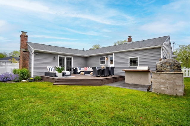 25 Jackwill Rd, East Patchogue, NY 11772 - back of house featuring an outdoor hangout area, a deck, and a chimney