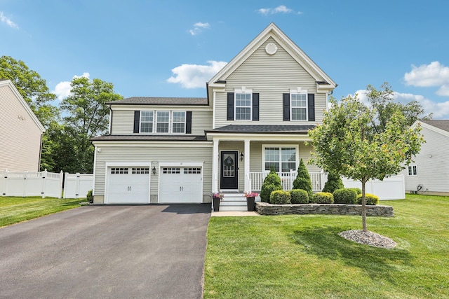 35 Laurel Cir, Goshen, NY 10924 - view of front of property with driveway, a porch, and a garage