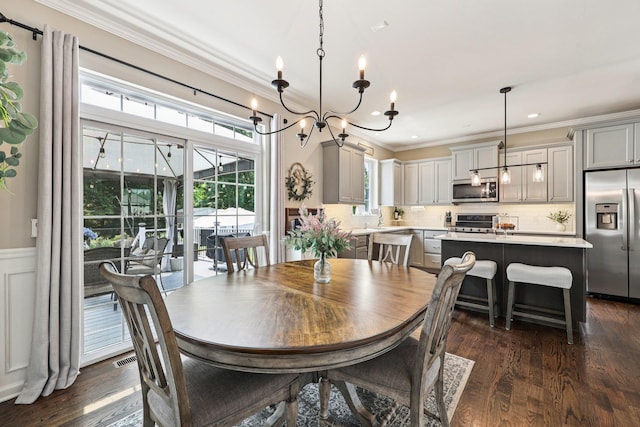 35 Laurel Cir, Goshen, NY 10924 - dining space featuring crown molding, a chandelier, dark wood-style flooring, wainscoting, and recessed lighting