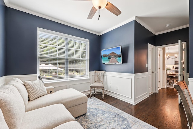 35 Laurel Cir, Goshen, NY 10924 - living area featuring a chandelier, dark wood-style flooring, ceiling fan, crown molding, and wainscoting