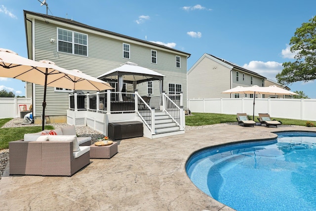 35 Laurel Cir, Goshen, NY 10924 - back of house with a gazebo, outdoor lounge area, a patio, and a fenced backyard