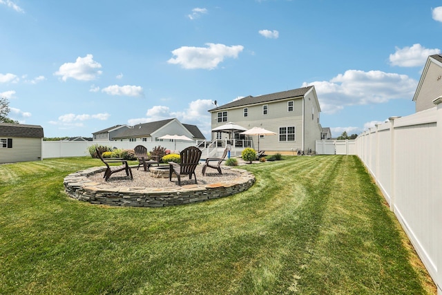 35 Laurel Cir, Goshen, NY 10924 - fenced backyard featuring a fire pit and a patio