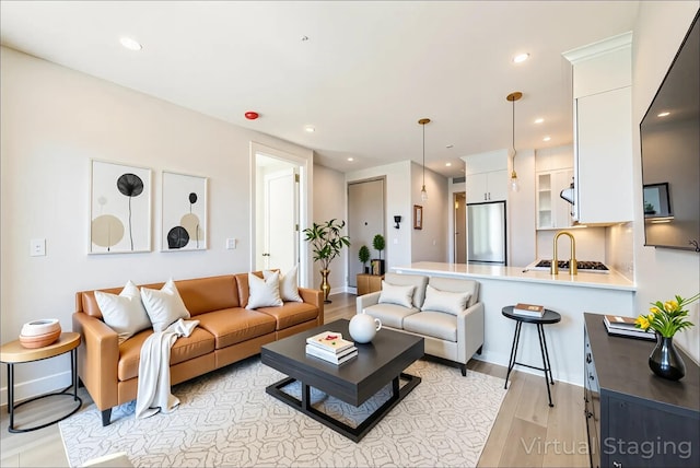 4209 Hampton St Unit 4B, Elmhurst, NY 11373 - living room with light wood-type flooring and recessed lighting